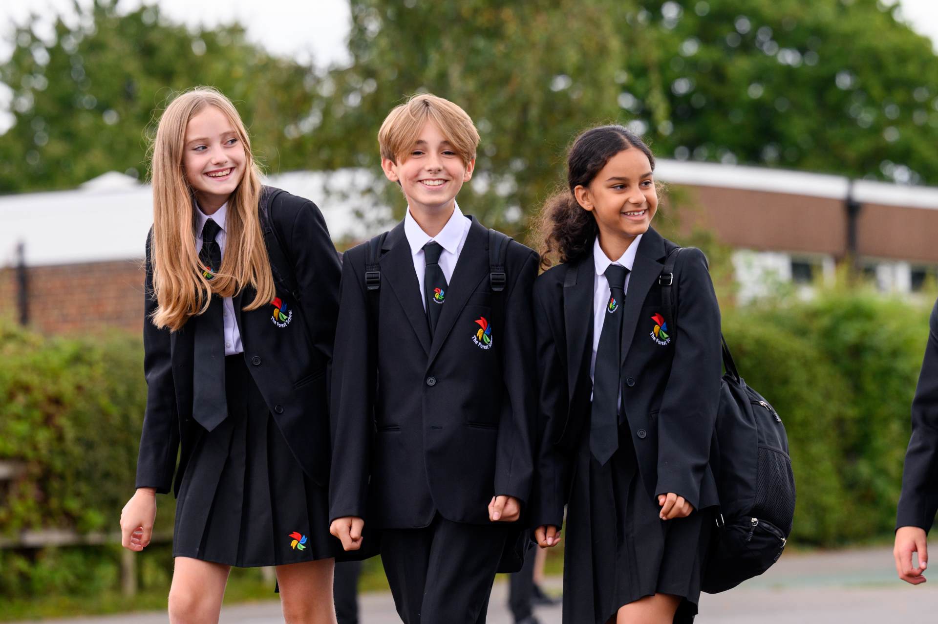 Forest students walking through the school's outdoor spaces